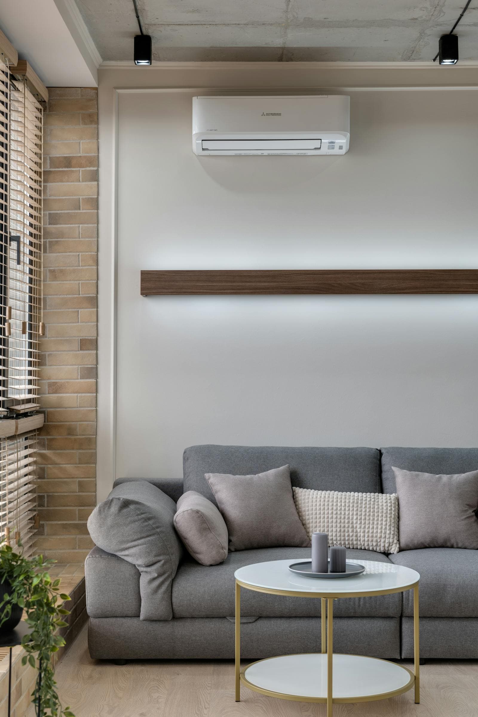 Living room with a wall-mounted air conditioner